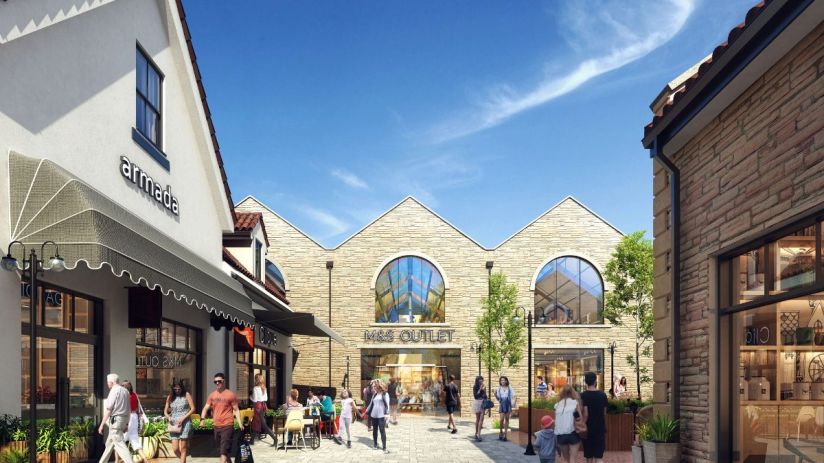 Modern business meeting with diverse professionals discussing new strategies in a corporate office setting, March 2026.