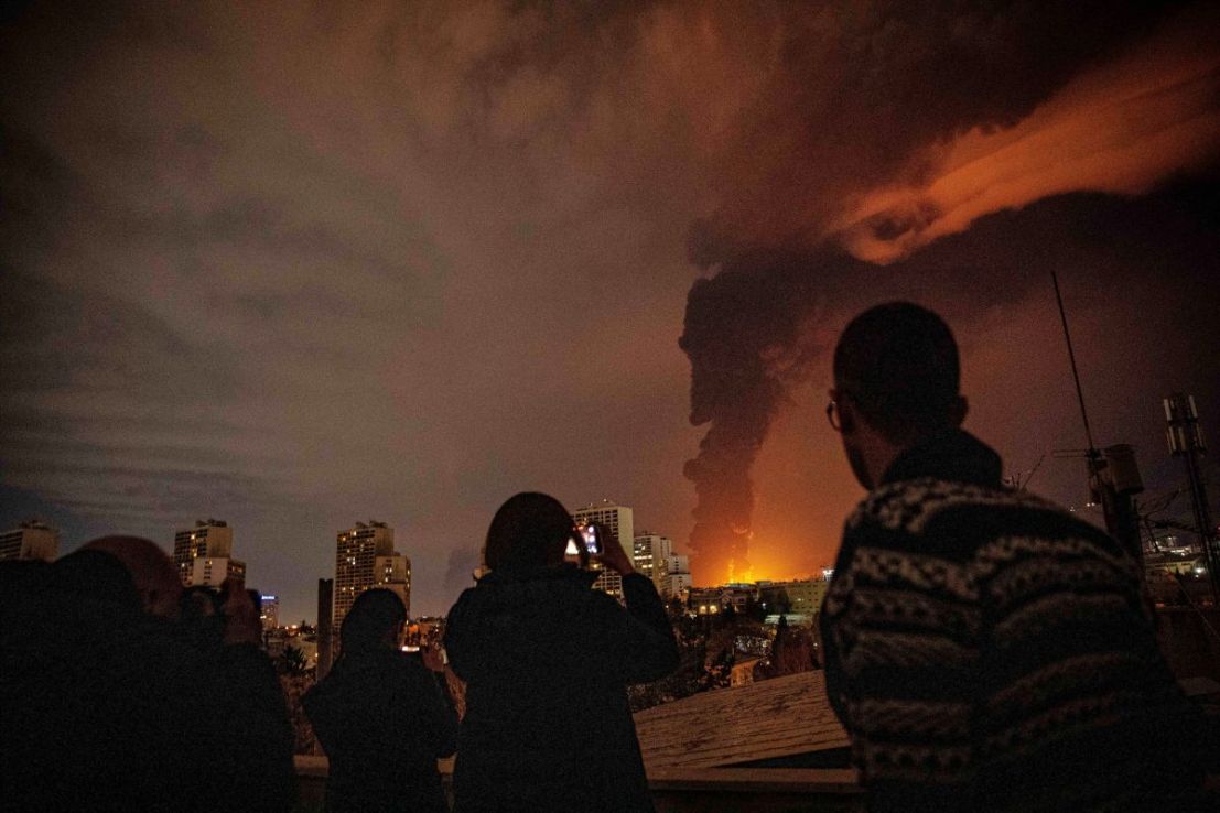 US-Israel strikes hit oil facilities in Tehran (Arileza Sotakbar/ISNA via AP)