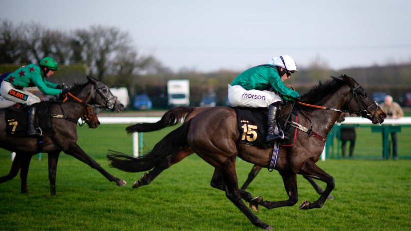 Watamu beach at sunrise with golden sands, turquoise waters, and local fishermen preparing their boats for a day at sea