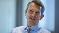 British Chambers President Andy Haldane speaking at a business conference, addressing economic growth and industry challen...