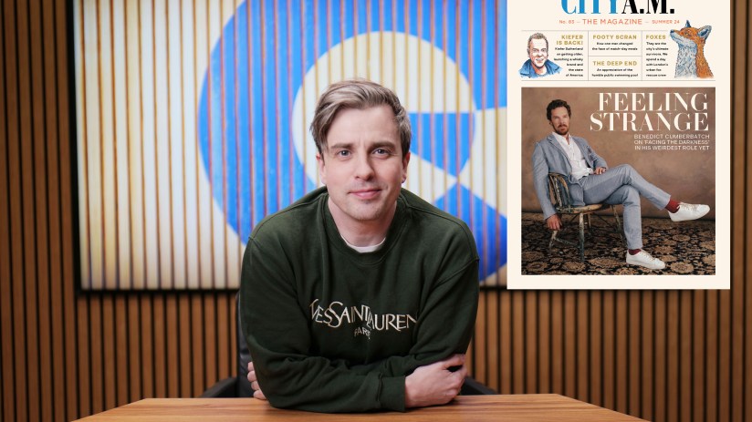 CityAM Magazine Award Ceremony, featuring winners holding trophies on stage, celebrating business excellence.