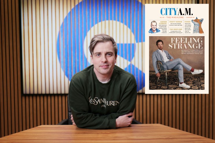 CityAM Magazine Award Ceremony, featuring winners holding trophies on stage, celebrating business excellence.