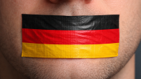 German flag with speech bubble symbolizing freedom of speech in Germany on a news website backdrop