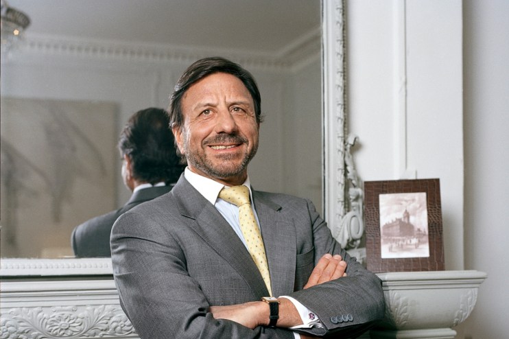 Rocco Forte, renowned hotelier, standing confidently in a luxury hotel lobby, showcasing elegance and hospitality expertise