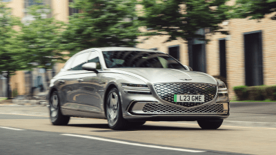 Detailed view of a significant business event, highlighting key speakers and attendees engaged in insightful discussions.