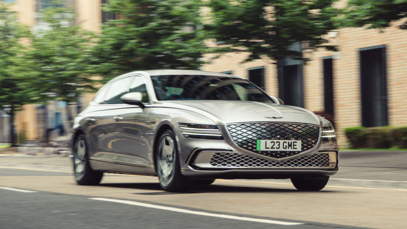 Detailed view of a significant business event, highlighting key speakers and attendees engaged in insightful discussions.