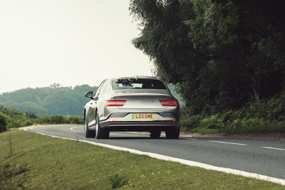 Breaking news event coverage with crowd gathered at the scene, reporters interviewing officials, and emergency services pr...