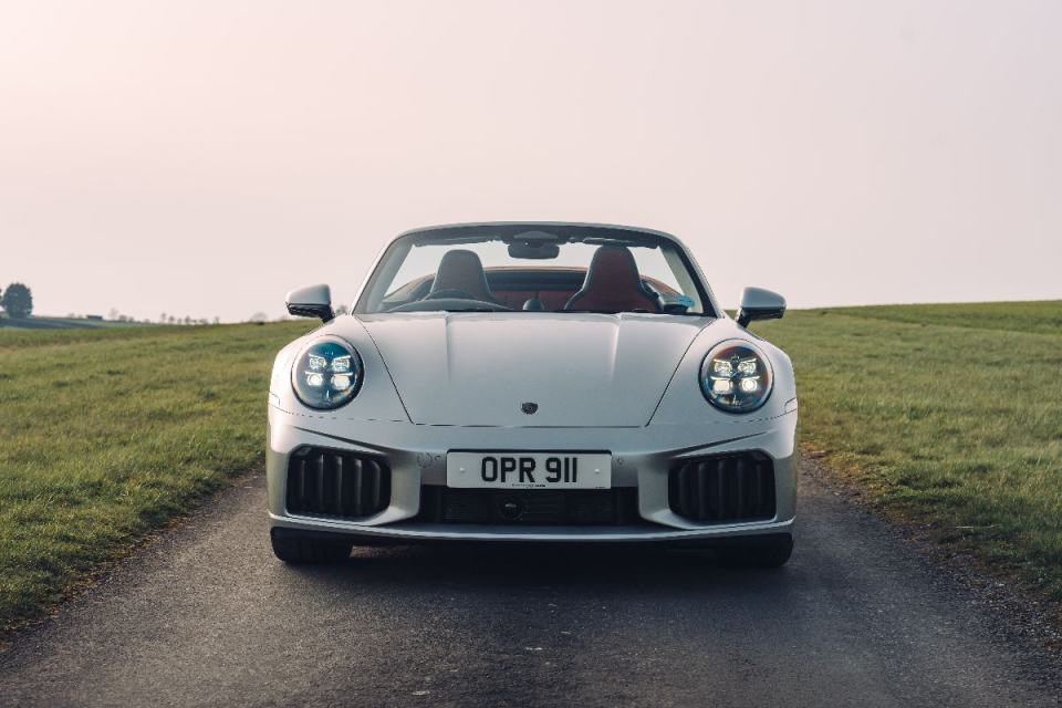 Breaking news update with a focus on current events, featuring a diverse group of business professionals in discussion.