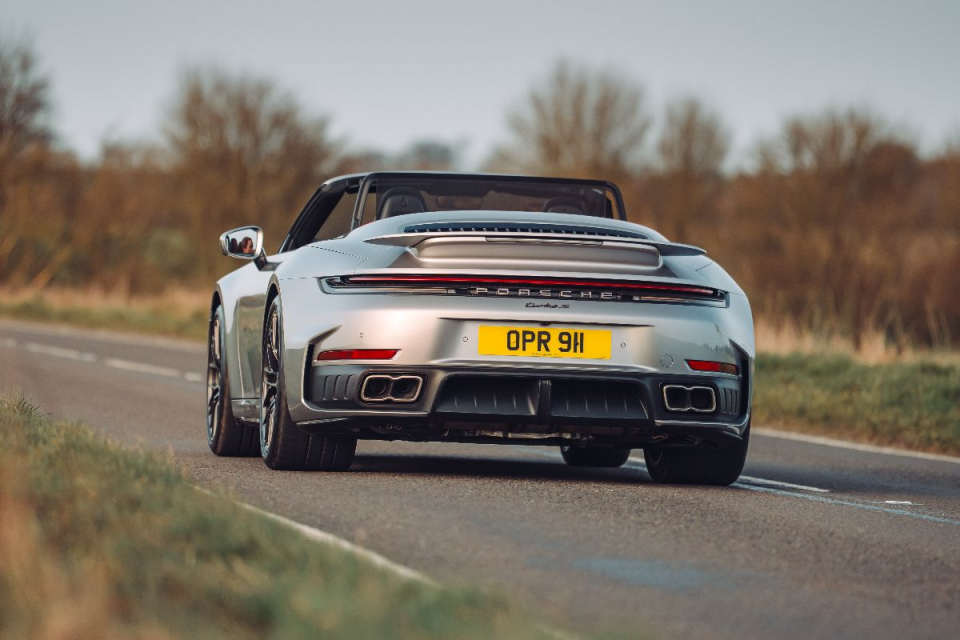 Breaking news image showing a significant event with key figures and a bustling crowd, conveying urgency and importance.