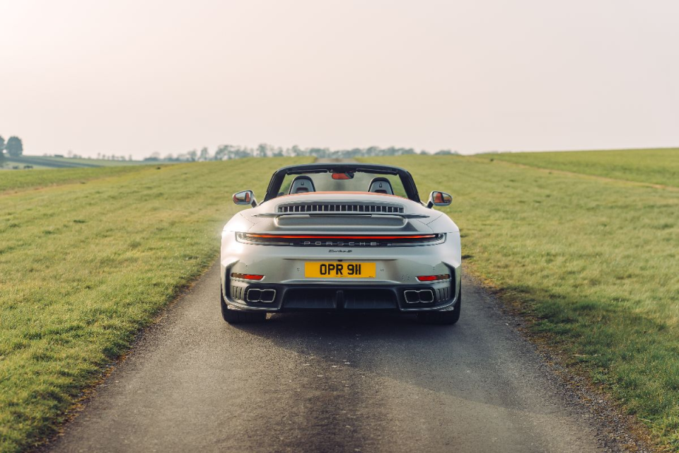 Breaking news concept with a digital globe, headlines, and a magnifying glass symbolizing global news coverage and analysis