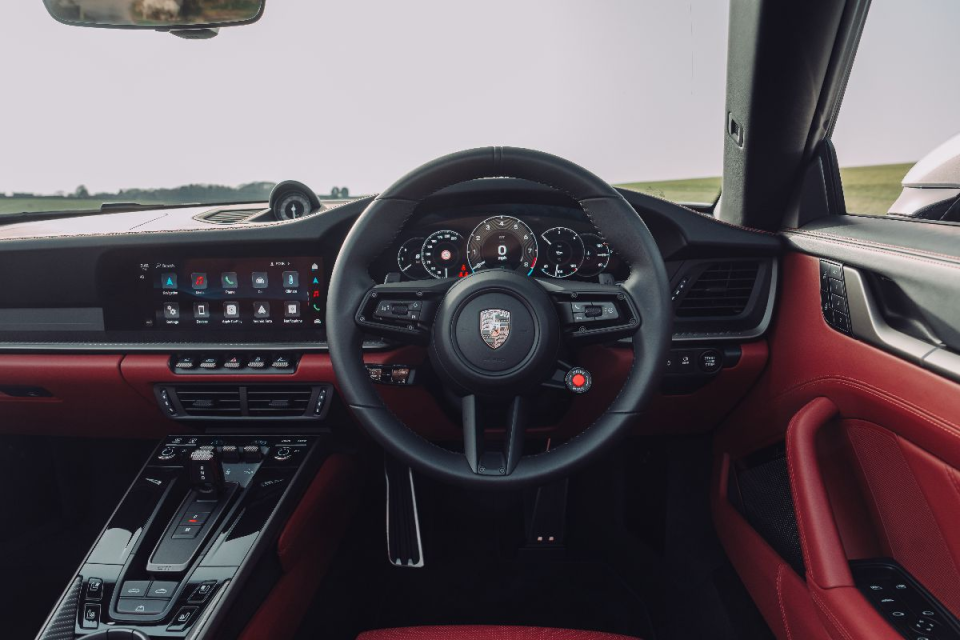 Breaking news event with reporters, microphones, and cameras capturing a significant announcement in a business setting