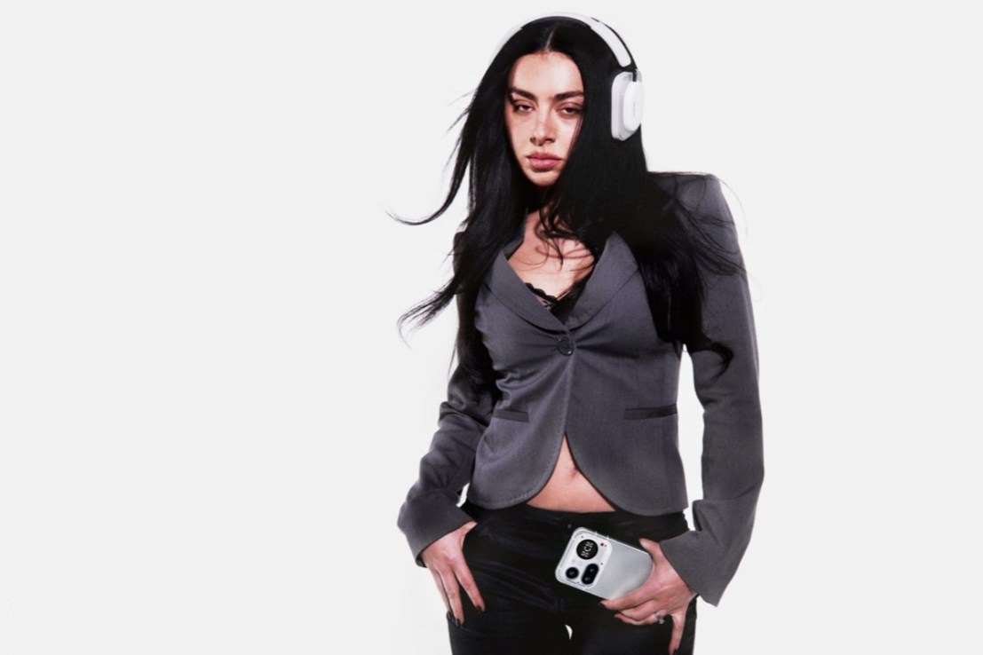 Charli XCX wearing the Nothing Headphones (a)