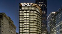 Revolut office interior showcasing modern workspace design with collaborative areas and tech-savvy workstations