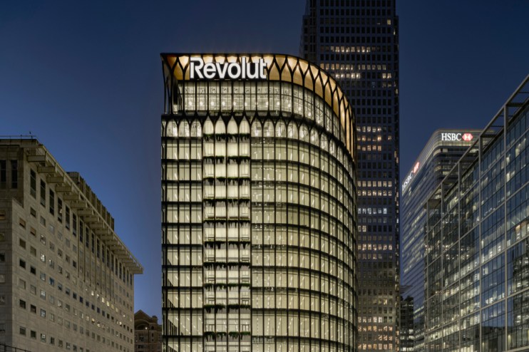 Revolut office interior showcasing modern workspace design with collaborative areas and tech-savvy workstations