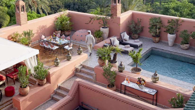 Traveler exploring a bustling city street with iconic landmarks and diverse cultural elements, highlighting urban adventure.