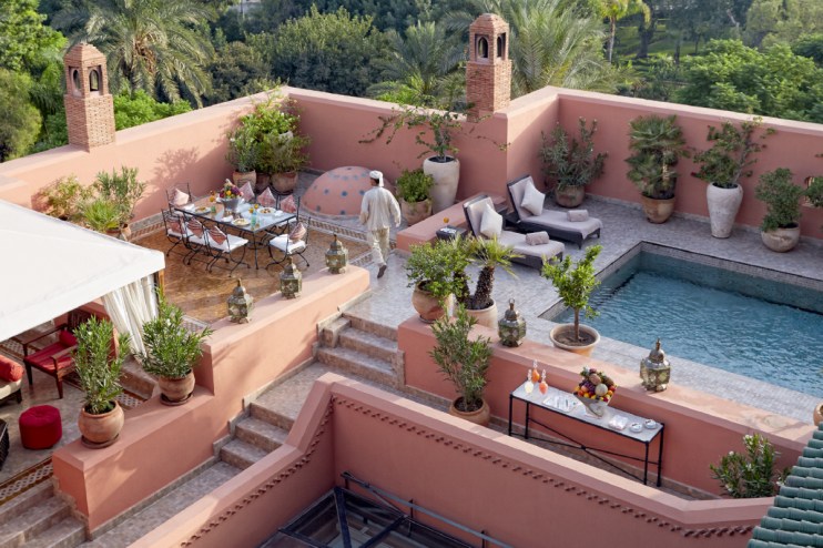 Traveler exploring a bustling city street with iconic landmarks and diverse cultural elements, highlighting urban adventure.