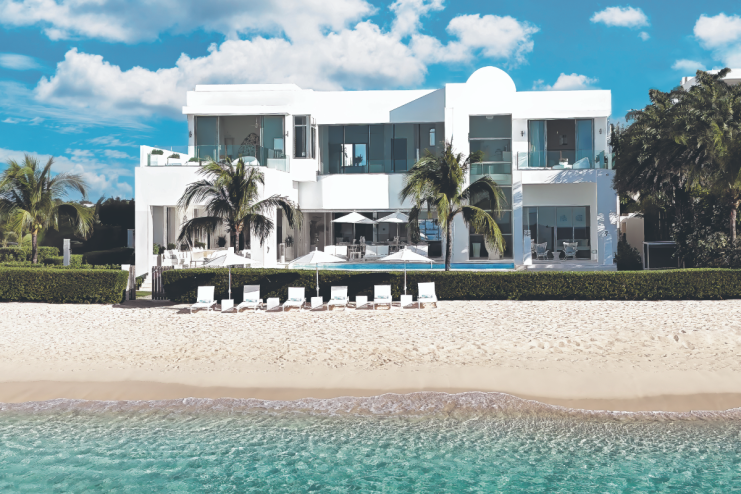 Scenic view of Anguillas pristine Caribbean beaches with turquoise waters and clear blue skies, highlighting island paradise.