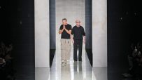 Dolce & Gabbana fashion collection showcase with elegant models on runway in vibrant, luxurious attire