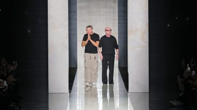 Dolce & Gabbana fashion collection showcase with elegant models on runway in vibrant, luxurious attire