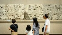 Elgin Marbles displayed in the British Museum, showcasing detailed ancient Greek sculptures and historic artistry.