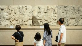 Elgin Marbles displayed in the British Museum, showcasing detailed ancient Greek sculptures and historic artistry.