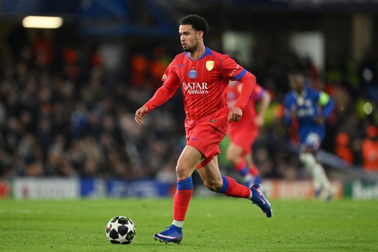 Breaking news event with people gathered, microphones, and cameras capturing the scene, highlighting media coverage dynamics