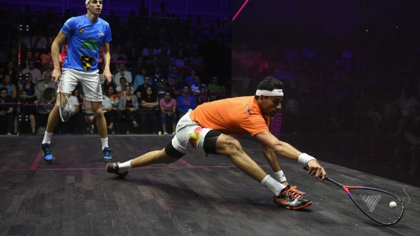 GettyImages 970474794 showcases a business meeting with diverse professionals discussing strategy around a conference table.