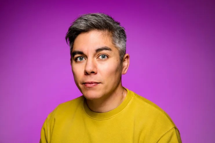 GoCardless co-founder and CEO Hiroki Takeuchi in a business landscape setting, showcasing leadership and innovation