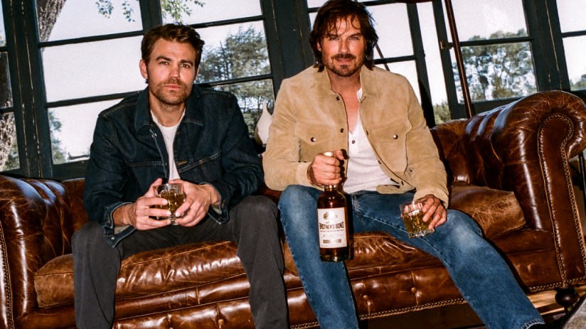 Ian and Paul discussing key strategies in a business meeting, highlighting collaborative planning for future projects.