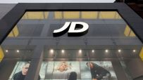 JD Sports storefront with branded signage and display windows showcasing athletic apparel and footwear