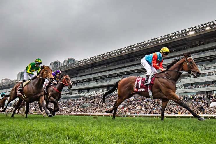 Ka Ying wins Chairmans Sprint, showcasing intense competition and dynamic action at the prestigious horse racing event.