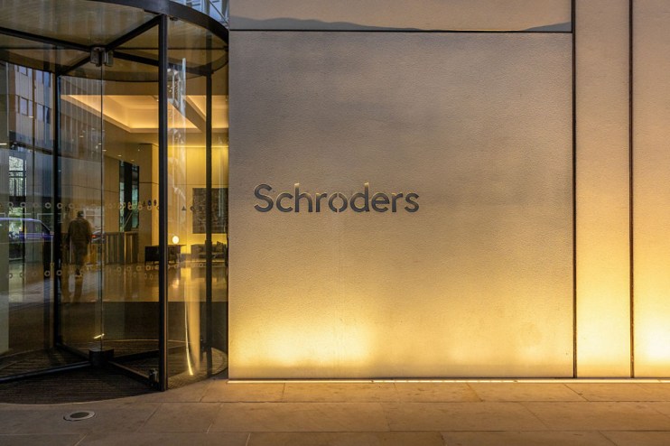 Schroders office building exterior with modern architecture and company logo prominently displayed in a business district ...