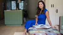 Vivien Wong showcasing Little Moons mochi ice cream in a business setting, highlighting her entrepreneurial success