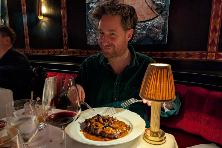 Breaking news banner with bold text and world map background indicating global news coverage on a business website