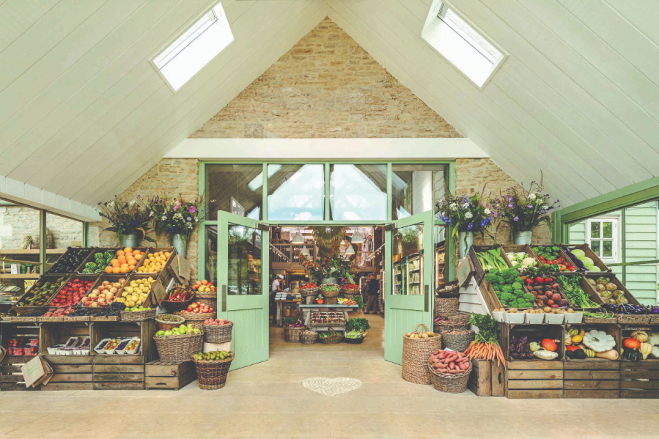 General news article image showing diverse group of professionals in a modern office setting collaborating on a project.