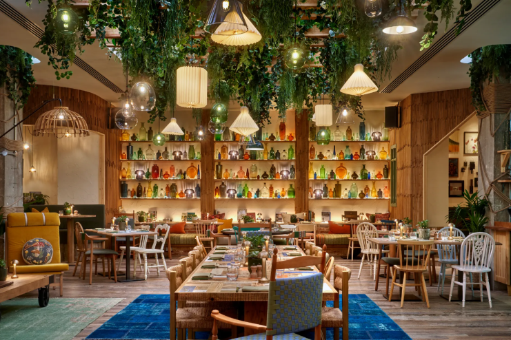 Breaking news concept with a digital clock displaying time, newspapers, and a smartphone, symbolizing timely news updates