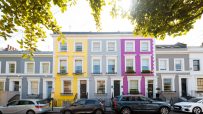 Kensington neighborhood street scene with historic architecture and bustling urban life