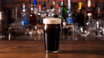 London pub scene with a pint of beer costing &pound;10, highlighting rising prices in the city drinking establishments