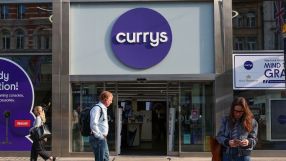 Currys storefront with prominent logo and modern exterior design, reflecting its role as a leading electronics retailer