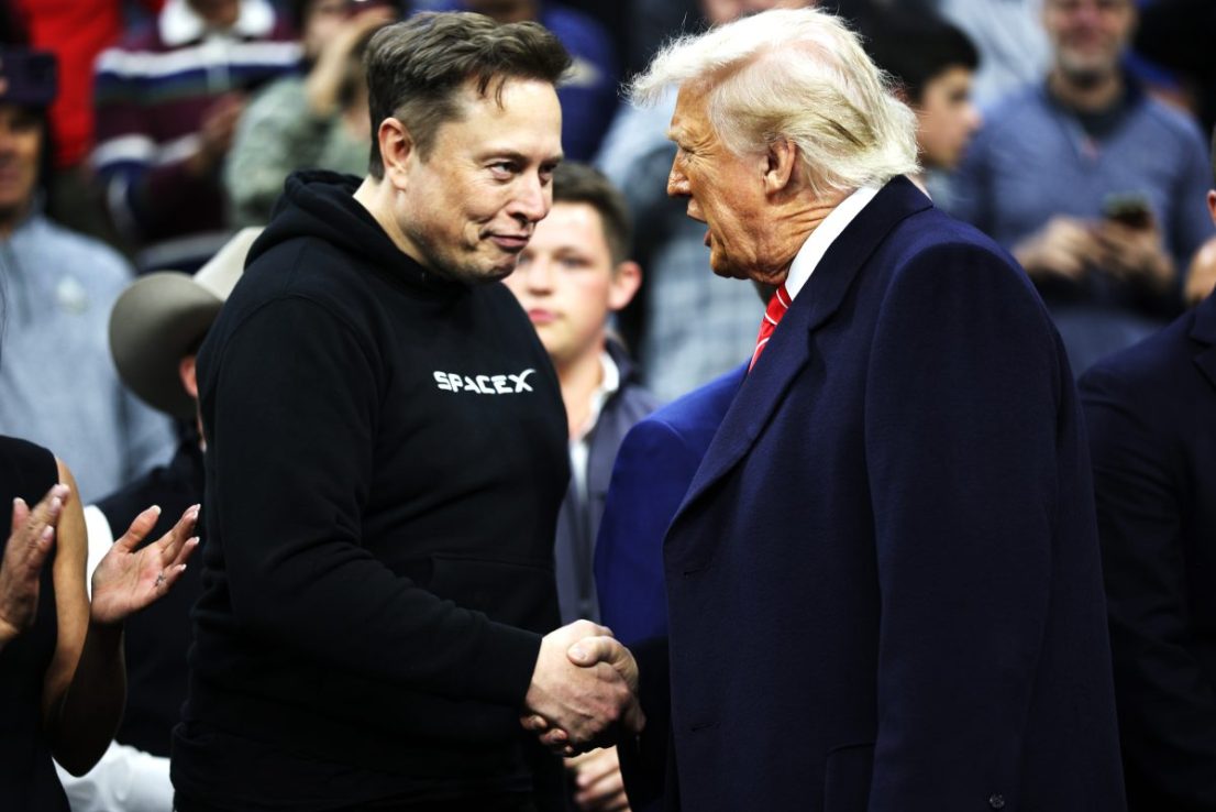 PHILADELPHIA, PENNSYLVANIA - MARCH 22: President Donald Trump and White House Senior Advisor, Tesla and SpaceX CEO Elon Musk shake hands while attending the NCAA Division I Wrestling Championship on March 22, 2025 in Philadelphia, Pennsylvania.  Trump last attended the NCAA wrestling championship in 2023 and has attended high-level sporting events since becoming president in January. (Photo by Kayla Bartkowski/Getty Images)