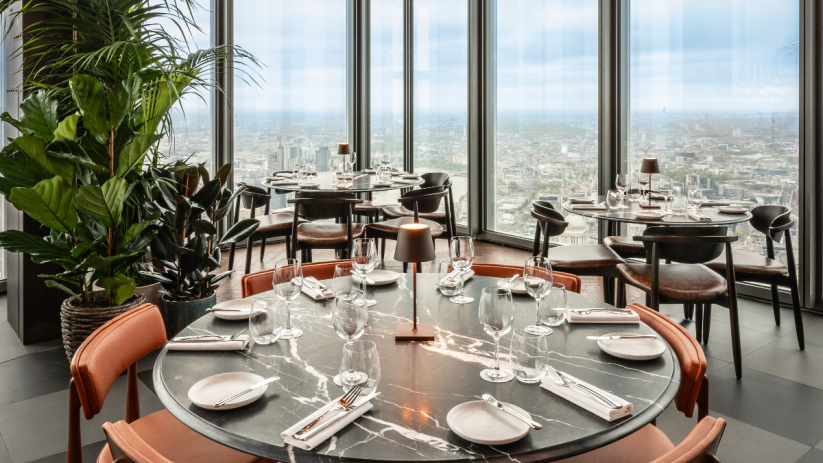 Gordon Ramsay dining experience at Bishopsgates Bread Street Kitchen bustling with patrons enjoying gourmet dishes