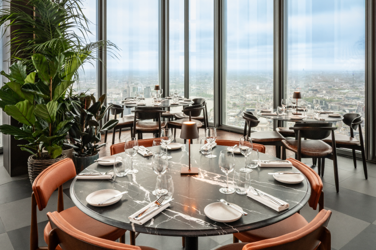 Gordon Ramsay dining experience at Bishopsgates Bread Street Kitchen bustling with patrons enjoying gourmet dishes
