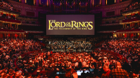 Royal Albert Hall illuminated for Films in Concert series, showcasing iconic movie scenes and live orchestral performances