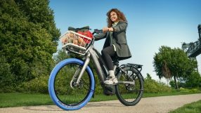 Swapfiets PowerPlus electric bike in urban setting, showcasing sleek design and modern features for sustainable commuting