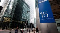 KPMG office building at Canary Wharf showcasing modern architecture and corporate environment.