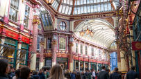 Leadenhall Market vibrant during City Square Mile festival with bustling crowds and colorful decorations