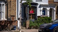 London residential architecture showcasing a classic townhouse with brick facade and traditional design elements