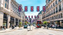 Bustling Regent Street showcasing vibrant storefronts and diverse pedestrians, capturing the essence of urban life.