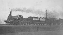 Victorian Express train journey showcasing historic locomotive and passengers in period attire for a scenic countryside ride