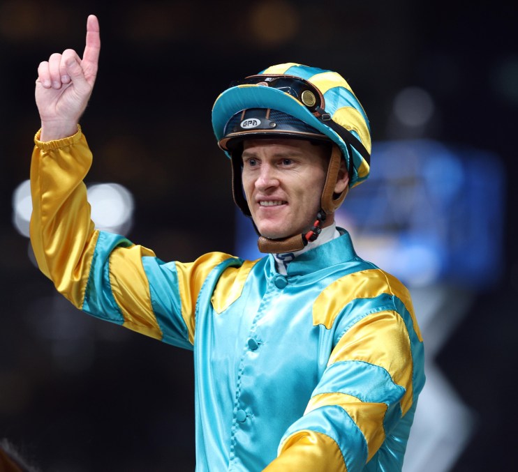 Zac Purton in action at a horse racing event, showcasing his skills as a top jockey on October 21, enhancing the races exc...